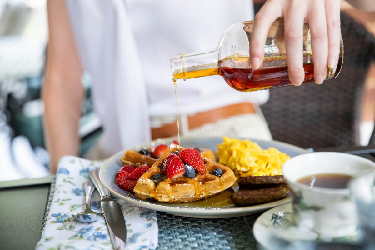 delicious waffles, eggs and sausage