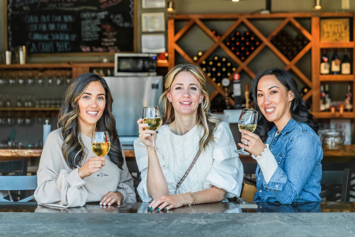 friends enjoying glasses of wine